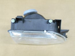 Oikea ajovaloumpio  MAGNETI MARELLI LPB561.  H4.  CARELLO 712367901129.   Ford Escort Mk5,  1990-1992